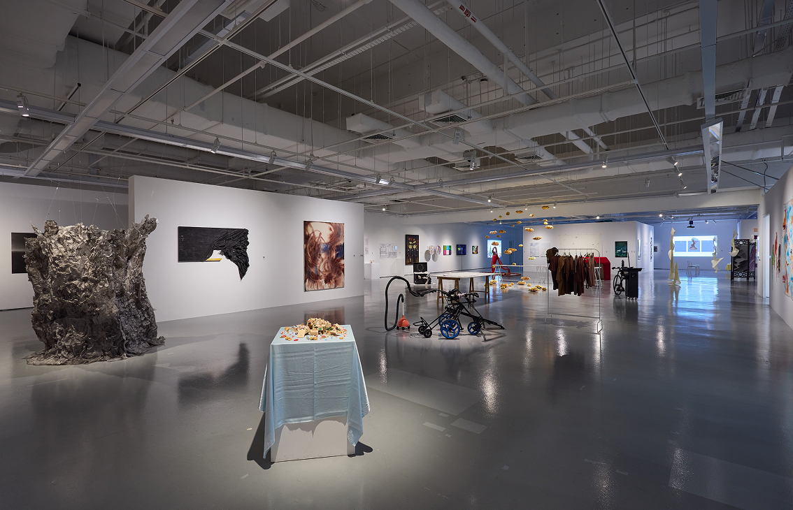 LASALLE exhibition hall with sculptures, mixed media and paintings displayed across wide open space under bright gallery lighting.