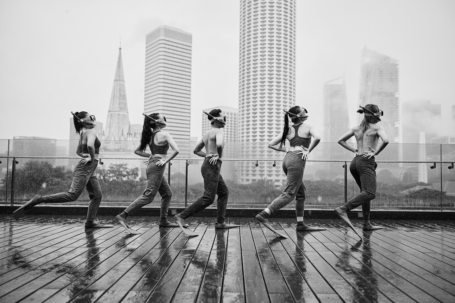 Students dance on in inclement weather.